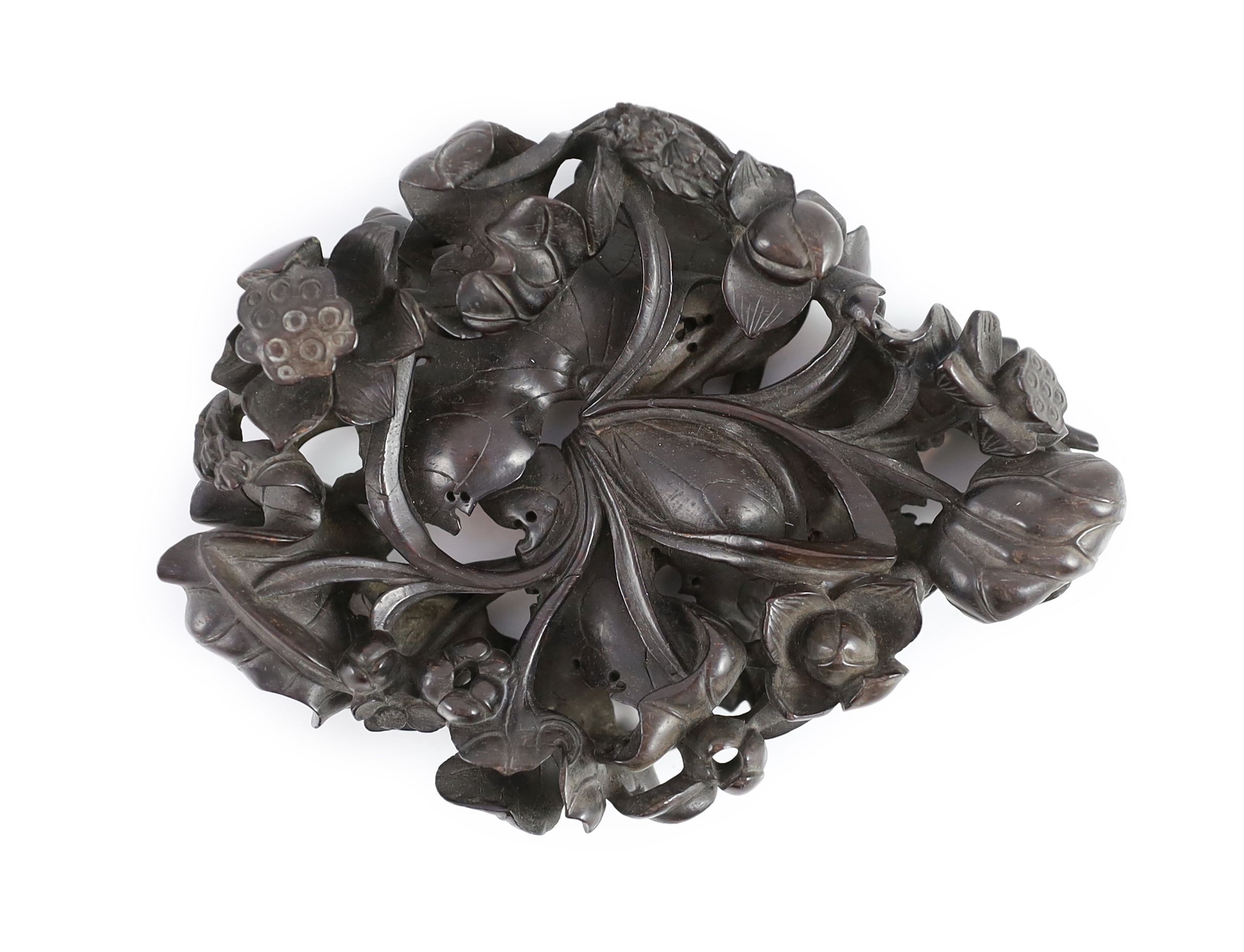 A fine Chinese carved zitan ‘lotus’ stand, Qing dynasty, 14.5cm long, small losses